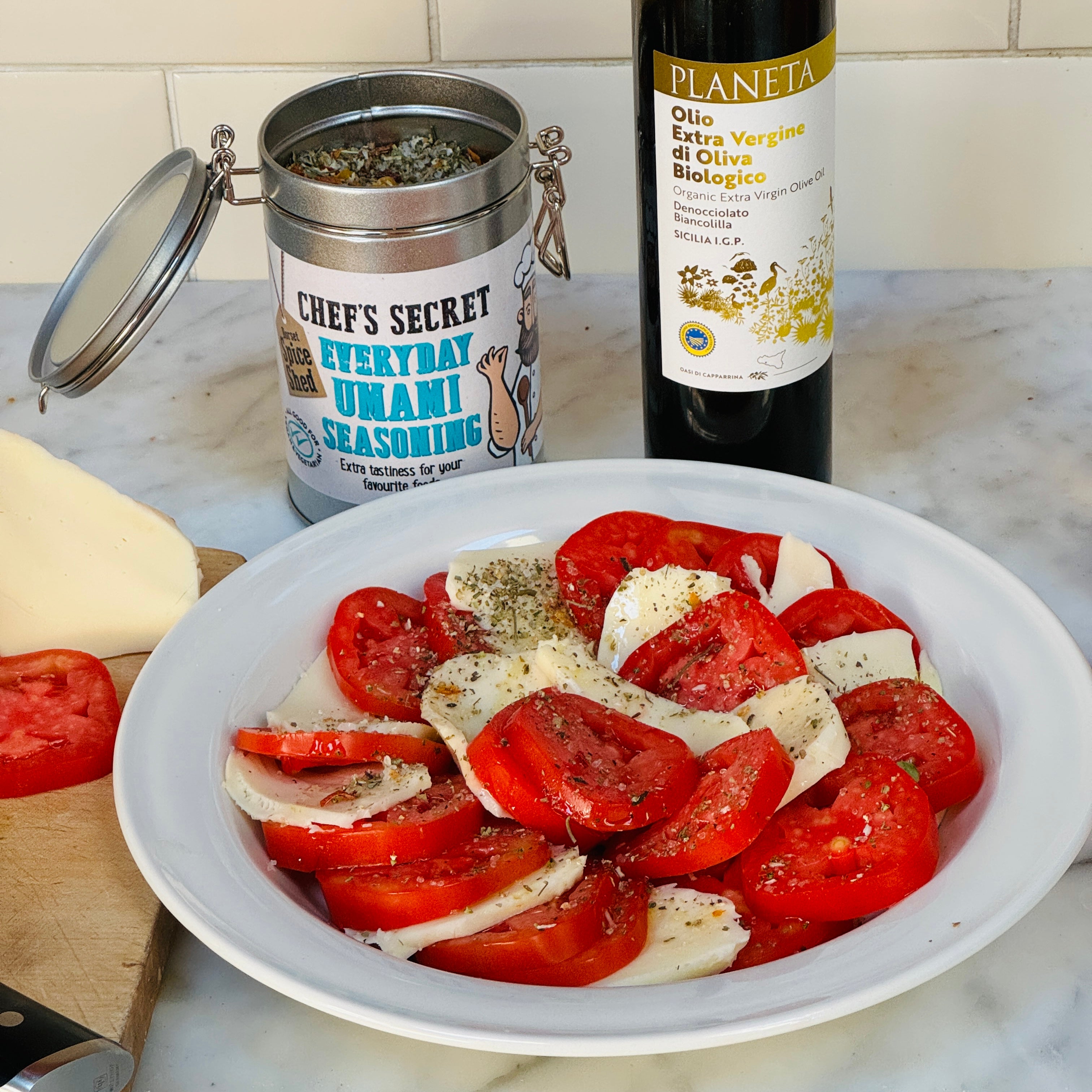 Bright red tomatoes and mozzarella cheese seasoned with Dorset Spice Shed Everyday Umami Seasoning